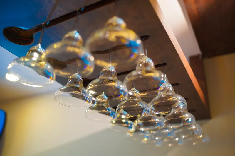Hanging wine glasses close-up